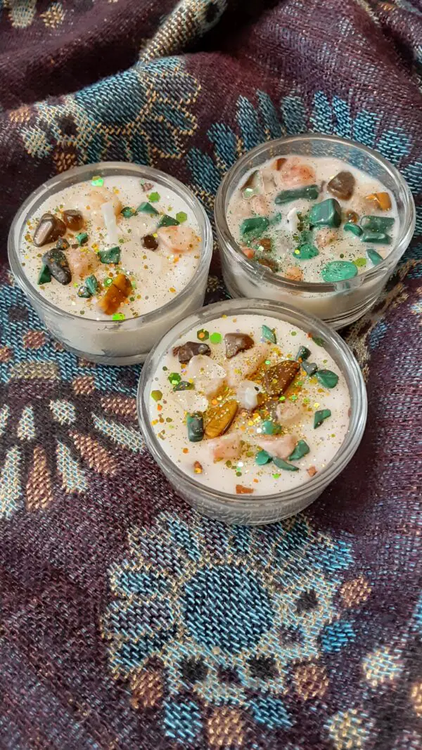 Three bowls of food on a table.