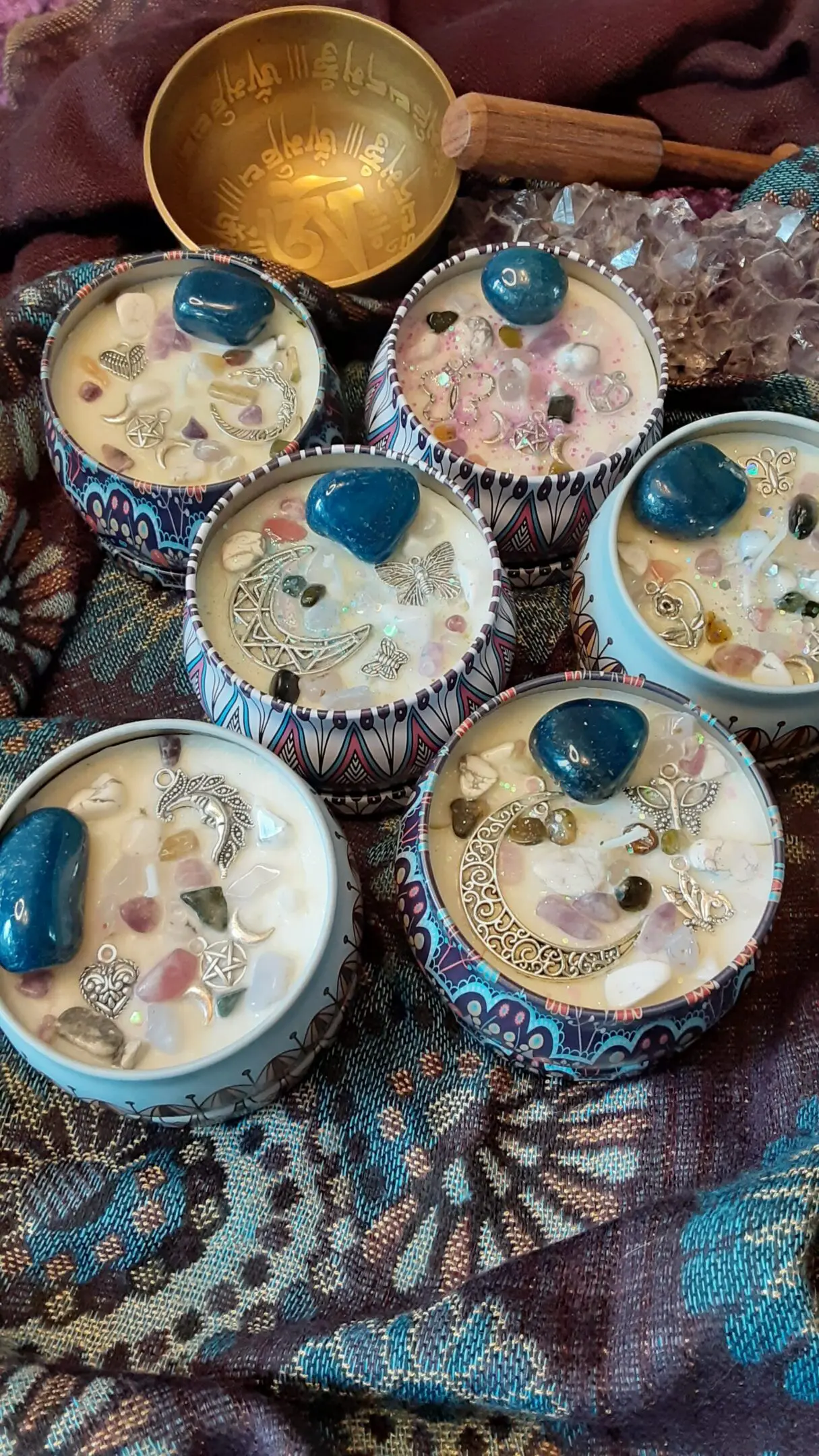 A close up of some cupcakes with jewels on them